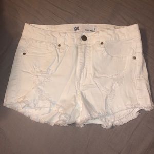 Distressed mid rise white shorts